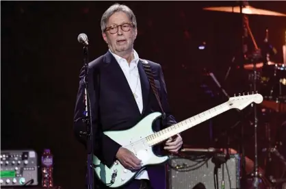  ?? Photograph: Gareth Cattermole/Getty Images ?? Clapton performing at the O2 in 2020.