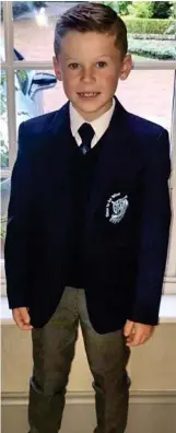  ??  ?? Proud: In his school uniform