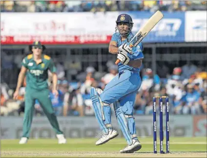  ?? Photo: Danish Siddiqui/Reuters ?? Smooth operator: India’s MS Dhoni doesn’t let the pressure get him down.