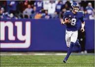  ?? Adam Hunger / Associated Press ?? Giants quarterbac­k Daniel Jones runs with the ball against the Colts on Jan. 1 in East Rutherford, N.J.