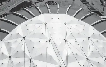  ?? JOHN MAHONEY/ GAZETTE FILES ?? A report this week said the number of tears in the Olympic Stadium’s roof has tripled from last year.