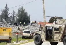  ?? AP ?? A warehouse in Lebanon destroyed by Israeli air strikes