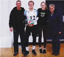  ??  ?? Moose Jaw’s Dax Whitehead is joined by his family after setting the all-time CCAA kills record.