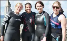  ?? Photo by Fergus Dennehy. ?? Justine Keogh, Una Buckley, Siobhán O’Leary and Susan Mullane getting ready to take part in the Tri Kingdom Come in Fenit on Saturday.