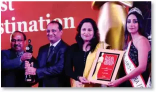  ??  ?? The award was given to Travelport Galileo and, received by Anoop Tewari, National Head (Relationsh­ip Management) and Taruna Soni, Head- Marketing