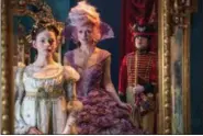  ?? DISNEY ?? Mackenzie Foy, left, and Keira Knightley appear in a scene from “The Nutcracker and the Four Realms.”