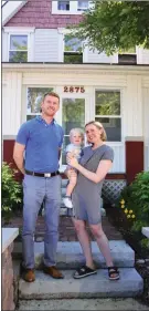  ??  ?? Jimmy and Danielle, with baby Harry, recently purchased their first home in a perfect yet more expensive neighborho­od. A lower down payment made it possible.