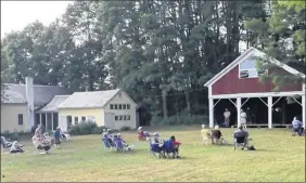  ?? Photos by Joseph Dalton ?? Socially distanced spectators enjoy a recent Music from Salem concert.