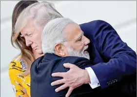  ?? REUTERS ?? Prime Minister Narendra Modi and US President Donald Trump hug each other during the former’s visit to the White House, in Washington, US, on 26 June 2017.