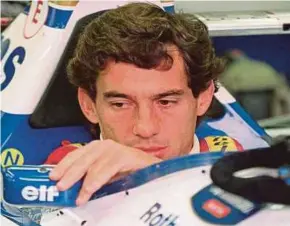  ?? AFP PIC ?? Ayrton Senna before the start of the San Marino Grand Prix in Imola, Italy. Today marks the 25th anniversar­y of Senna’s death.