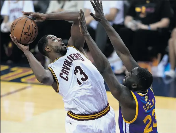  ?? — GETTY IMAGES FILES ?? The defence supplied by Golden State Warriors forward Draymond Green could be a big factor for Game 6 of the NBA Finals on Thursday in Cleveland, especially with Warriors centre Andrew Bogut out with a knee injury. Golden State leads the series 3-2.