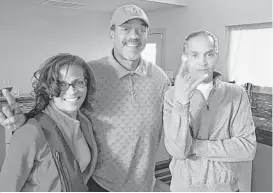  ?? Courtesy of Mildred Whittier ?? Julius Whittier, center, who was the first black letterman in UT history, these days relies on sister Mildred. Former UT teammate Leon O’Neal joins the pair.