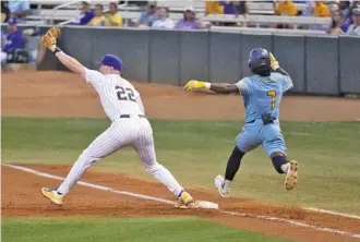  ?? HILARY SCHEINUK/THE ADVOCATE VIA AP ?? LSU first baseman Jared Jones makes the catch in time to put out visiting Southern’s Khyle Radcliffe on Monday night in Baton Rouge.