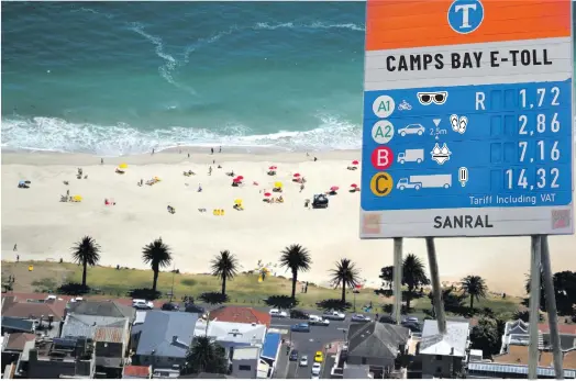  ?? ?? Above: Camps Bay Beach. (Photo: Wikimedia Commons); e-tolls sign. (Photo: Fani Mahuntsi/gallo Images); Beach icon graphics. (Vecteezy); Below: About 2,000 Cosatu members marched in the CBD in Johannesbu­rg on 14 November 2013 to protest against e-tolls and labour brokers.
Photo: Daniel Born/the Times/gallo Images