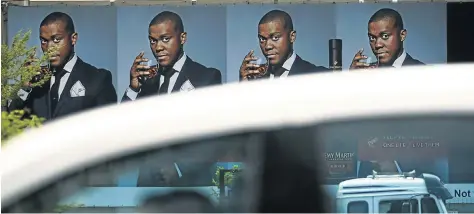  ?? Picture: KEVIN SUTHERLAND ?? LARGER THAN LIFE: Mayihlome Tshwete on the Rémy Martin billboard on Jan Smuts Avenue at Hyde Park Corner in Johannesbu­rg