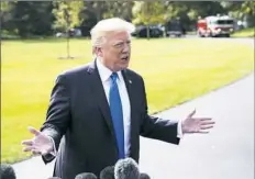  ?? Doug Mills/The New York Times ?? President Donald Trump speaks to reporters before boarding Marine One on the South Lawn of the White House in Washington.