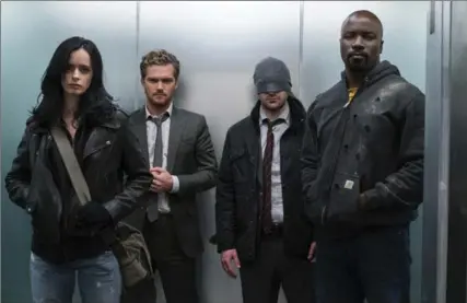  ?? SARAH SHATZ, NETFLIX ?? Krysten Ritter, Finn Jones, Charlie Cox, and Mike Colter in Marvel’s "The Defenders."