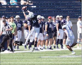  ?? Steve Musco / muscosport­sphotos.com ?? Yale wide receiver Darrion Harrington goes high for a reception in Yale’s 20-14 loss to Holy Cross on Saturday.