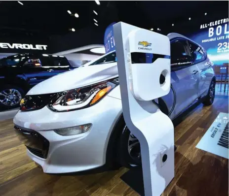  ?? FREDERIC J. BROWN/AFP/GETTY IMAGES ?? The Chevrolet Bolt EV was the winner of the 2017 Green Car of the Year award.