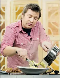  ?? CHRIS YOUNG ?? British chef Jamie Oliver is an investor in the new restaurant, Maison Publique, but the food, decor and concept will be left up to Dammann.