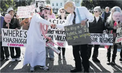  ?? Picture: Reuters ?? PROTEST. Activists dressed as Saudi Crown Prince Mohammad bin Salman and US President Donald Trump shake hands during a demonstrat­ion outside the White House in Washington at the weekend calling for sanctions against Saudi Arabia and to protest the disappeara­nce of Saudi journalist Jamal Kashoggi.