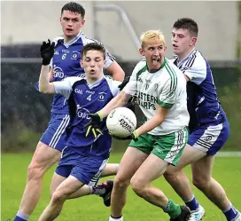  ??  ?? Martin Doherty of Eastern Harps in possession.