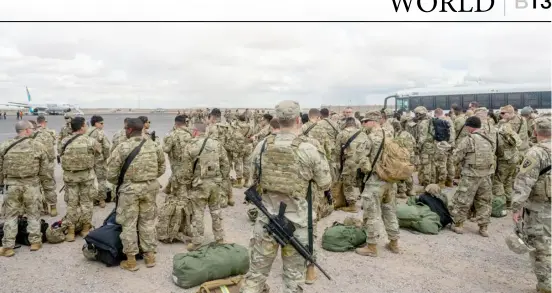  ?? BRANDON BELL/GETTY IMAGES VIA AGENCE FRANCE-PRESSE ?? SOME 200 guardsmen arrived at the Million Air El Paso ELP airport in El Paso, Texas to provide extra security along the city’s southern border. Four days ago, hundreds of migrants seeking asylum clashed with Texas national guardsmen while waiting to turn themselves in to border patrol agents for processing.