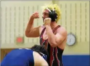  ?? AUSTIN HERTZOG - DIGITAL FIRST MEDIA ?? Boyertown’s Jacob Miller reacts after defeating SpringFord’s Chase Smith to win the 182-pound final 3-2 at the District 1-AAA Central Tournament Saturday at SpringFord.