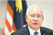  ??  ?? Najib speaking at a press conference at the Trump Internatio­nal Hotel. — Bernama photo