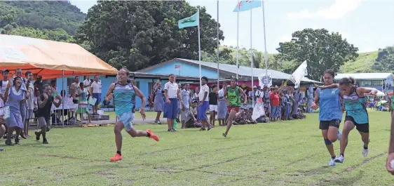  ?? Photo: Manhar Lal ?? Rejieli Nagata of St Johns College (left), comes home first in the Lomaiviti Zone junior girls’ 100 metres final, with a time of 14.12 seconds at the SJC grounds. Second is Lusiana Cabenaiser­au of Levuka Public School clocking 14.13sec; third is Kelera Koroikaraw­a of SJC clocking 14.43sec and fourth is Asilika Maramanime­ke of SJC clocking 14.43sec.