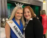  ?? PHOTOS BY GINA JOSEPH - THE MACOMB DAILY ?? Miss Michigan Teen Kylie D’Andrea of St. Clair Shores poses with Helen Hicks, president and CEO of Macomb County Habitat for Humanity during Thursday’s spring luncheon and fundraiser at the Italian American Cultural Society in Clinton Township.