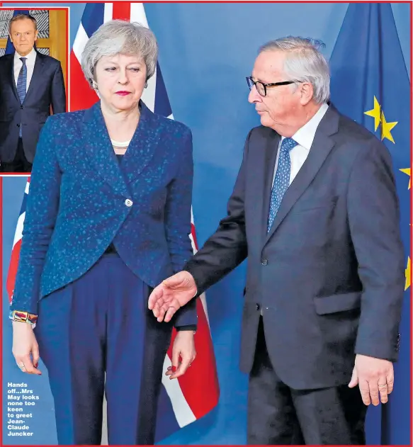  ?? Picture: OLIVIER HOSLET/EPA ?? Hands off...Mrs May looks none too keen to greet JeanClaude Juncker
