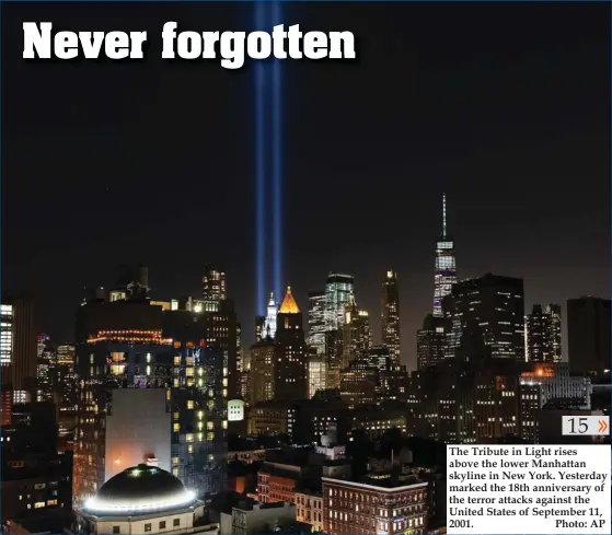  ?? Photo: AP ?? The Tribute in Light rises above the lower Manhattan skyline in New York. Yesterday marked the 18th anniversar­y of the terror attacks against the United States of September 11, 2001.