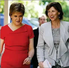  ?? ?? exercise in deception: Nicola Sturgeon and Lena Wilson, chief executive of Scottish Enterprise, head for a meeting in California