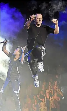  ?? – aFP ?? Flying high: Knight ( left) and Wahlberg performing during The Main event tour in Las Vegas last month.