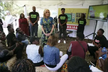  ?? BRIAN INGANGA — THE ASSOCIATED PRESS ?? US first lady Jill Biden, centre, meets youth at Village Creative Feb. 25in Nairobi, Kenya.