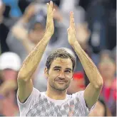  ??  ?? Roger Federer celebrates victory over Juan Martin del Potro yesterday