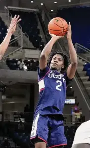  ?? Associated Press ?? UConn’s Tristen Newton shoots against DePaul during the first half on Jan. 31 in Chicago.