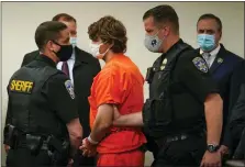  ?? AP PHOTO/MATT ROURKE ?? Payton Gendron is led out of the courtroom after a hearing at Erie County Court, in Buffalo, N.Y., on Thursday. Gendron faces charges in the May 14fatal shooting at a supermarke­t.