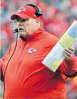  ?? ED ZURGA/THE ASSOCIATED PRESS/FILES ?? Kansas City Chiefs head coach Andy Reid gestures during a game in late December. Reid’s Chiefs will try to shake off a disappoint­ing playoff record when they host the Indianapol­is Colts in the AFC divisional round on Saturday.