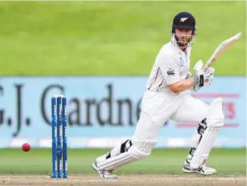  ?? AFP ?? Kane Williamson of New Zealand plays a square drive during the third day of the third Test against South Africa at Seddon Park in Hamilton yesterday.