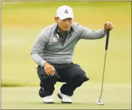  ?? Michael Reaves / Getty Images ?? Sung Kang of Korea looks over a putt on the 16th green during the second round of the AT&T Byron Nelson at Trinity Forest Golf Club on Friday in Dallas.
