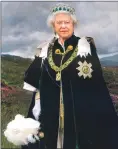  ?? Photograph Julian Calder ?? Her Majesty The Queen wearing the robes of the Order of the Thistle.