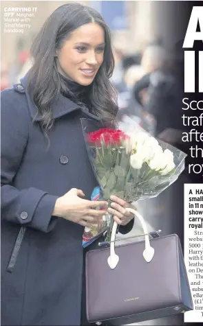  ??  ?? CARRYING IT OFF Meghan Markle with Strathberr­y handbag