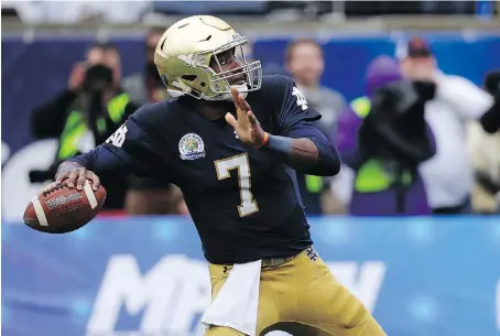  ?? THE ASSOCIATED PRESS FILES ?? Quarterbac­k Brandon Wimbush will be under centre for the NCAA’s No. 12-ranked Fighting Irish when they host No. 14 Michigan to open the season Saturday night. Wimbush battled with Ian Book for the position in the spring but has come out on top for now.