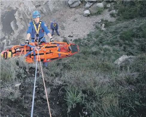  ??  ?? A CRO rope rescue technician in action.