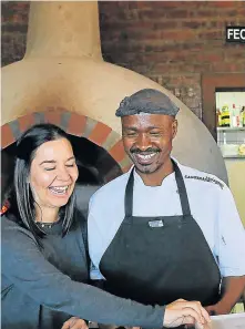  ?? Picture: SIBONGILE NGALWA ?? GREAT TEAMWORK: Natasha Hogg and Sanook Eatery chef Mzukisi Yiliwe. ‘Whatever success [husband] Jamie and I have had, it is all about the people alongside us, and right now there are 150 of them,’ says Natasha.