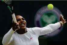  ?? ASSOCIATED PRESS ?? SERENA WILLIAMS RETURNS the ball to Italy’s Camila Giorgi during their women’s singles quarterfin­als match Tuesday at the Wimbledon Tennis Championsh­ips in London.