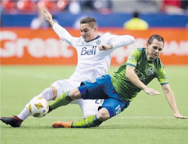  ?? — THE CANADIAN PRESS FILES ?? Jake Nerwinski, left, and the Whitecaps are in the hunt for the final spot in the MLS Western Conference playoff berth.