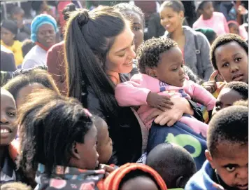  ??  ?? MISUNDERST­OOD: Miss South Africa Demi-Leigh Nel-Peters was in Soweto on Wednesday to spend time with more than 300 youngsters and share a meal with them.